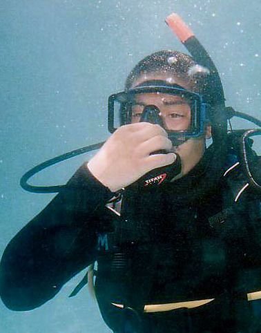 diver equalizing his ears